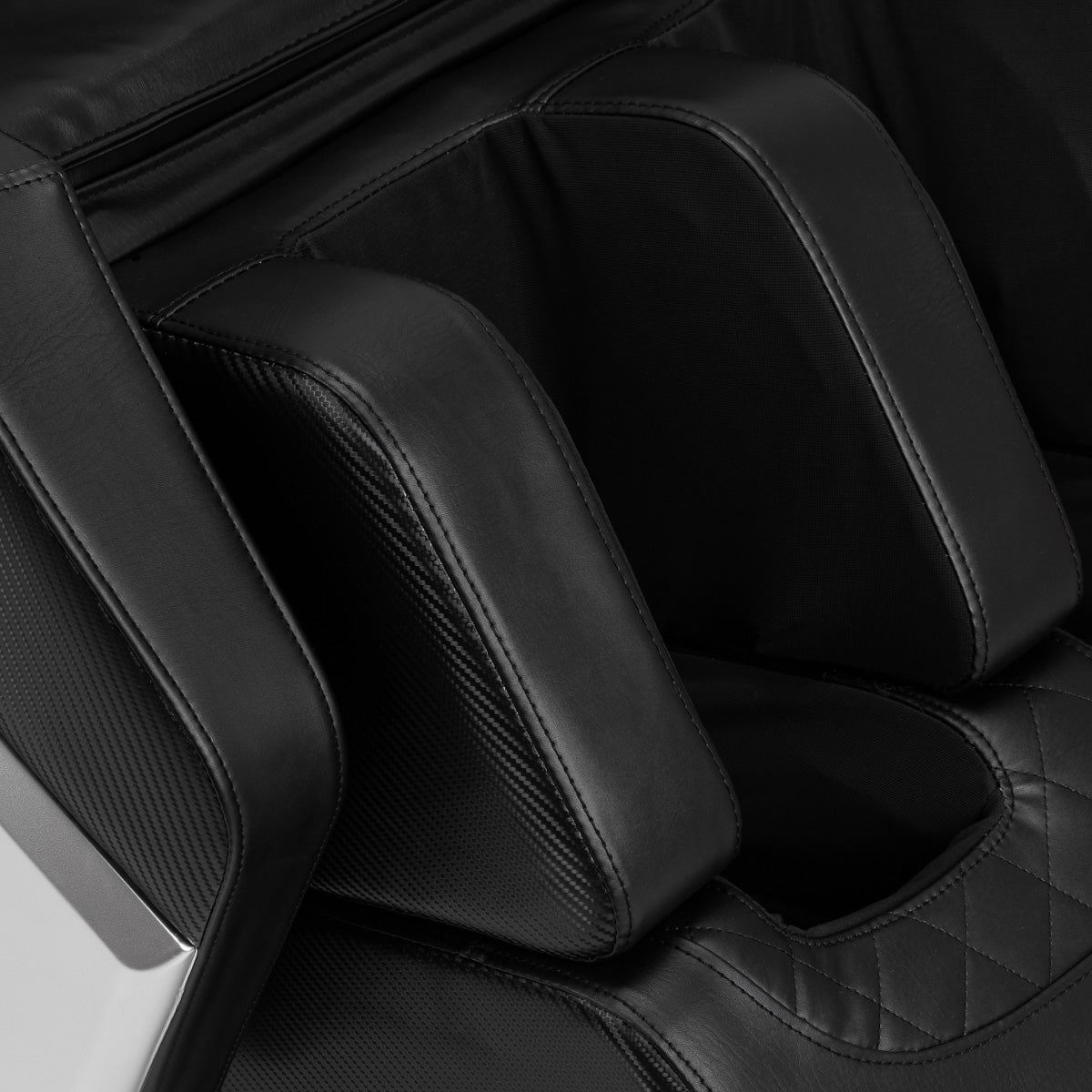 Black Sakura Prime 108 massage chair showing padded armrests, control panel, and ergonomic design for relaxation and comfort.