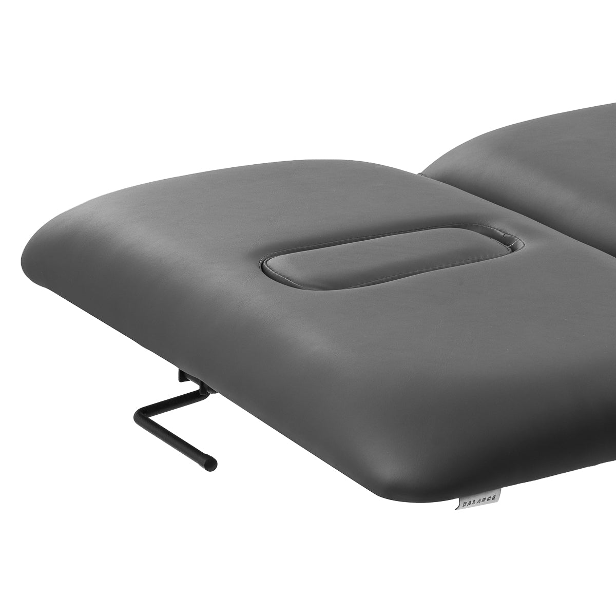 Grey massage table with face opening and removable cushion