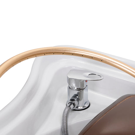 Gabbiano Head Spa 017 hair washing bed in brown with cushioned surface and built-in headrest for comfortable hair care.