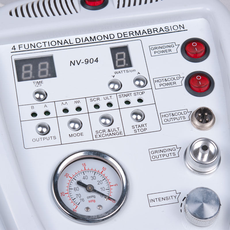 Beauty System 4-in-1 Diamond Microdermabrasion Machine BN-904 with multiple treatment heads and a sleek design for skincare procedures.