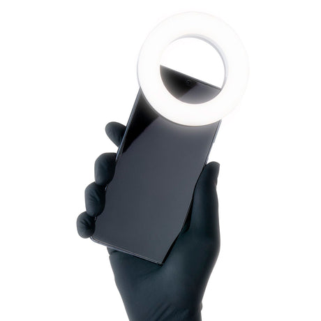 PhiAcademy PhiLuminate Clip-On LED Ring Light — ring light and phone held in a gloved hand