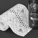 Tattoo Eazer protective film in 15cm x 10m roll, clear adhesive film for tattoo aftercare and skin protection.