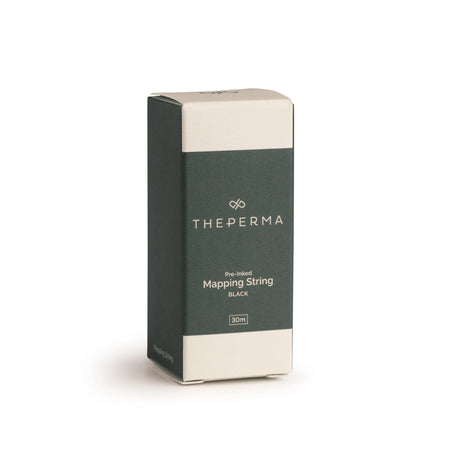 The Perma Mapping String Bottle in black, red, and white with a cylindrical shape and colorful printed design.